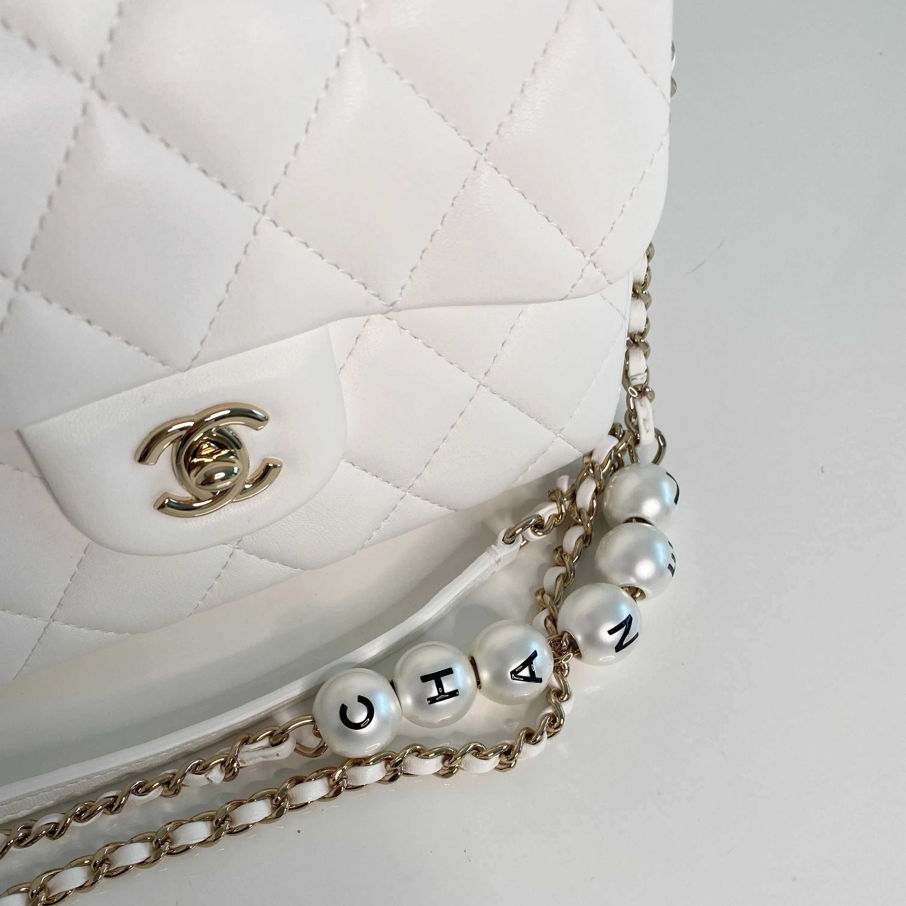 Chanel Pearl Logo Strap Flap Bag White